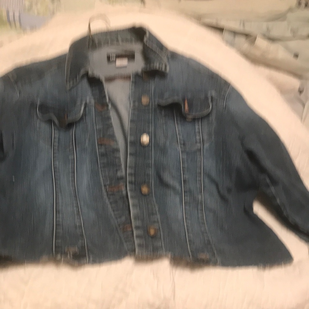 Lee’s Jean jacket with bottom cut off, fair condition , small hole on elbow.